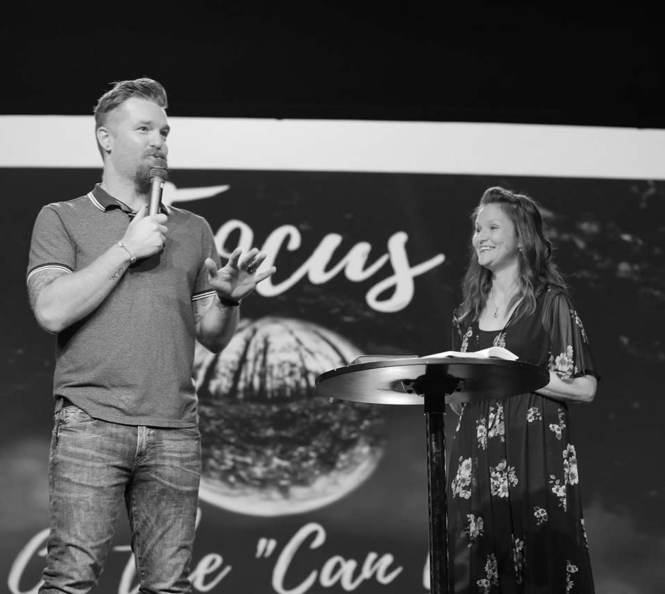 Alex and Tara Speaking at Convention