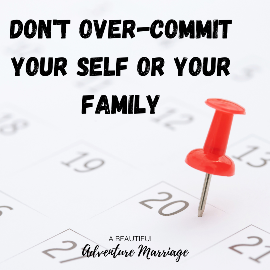 A calendar with a red pin on the 20th. Above it the words, " Don't Over-Commit yourself or your family."